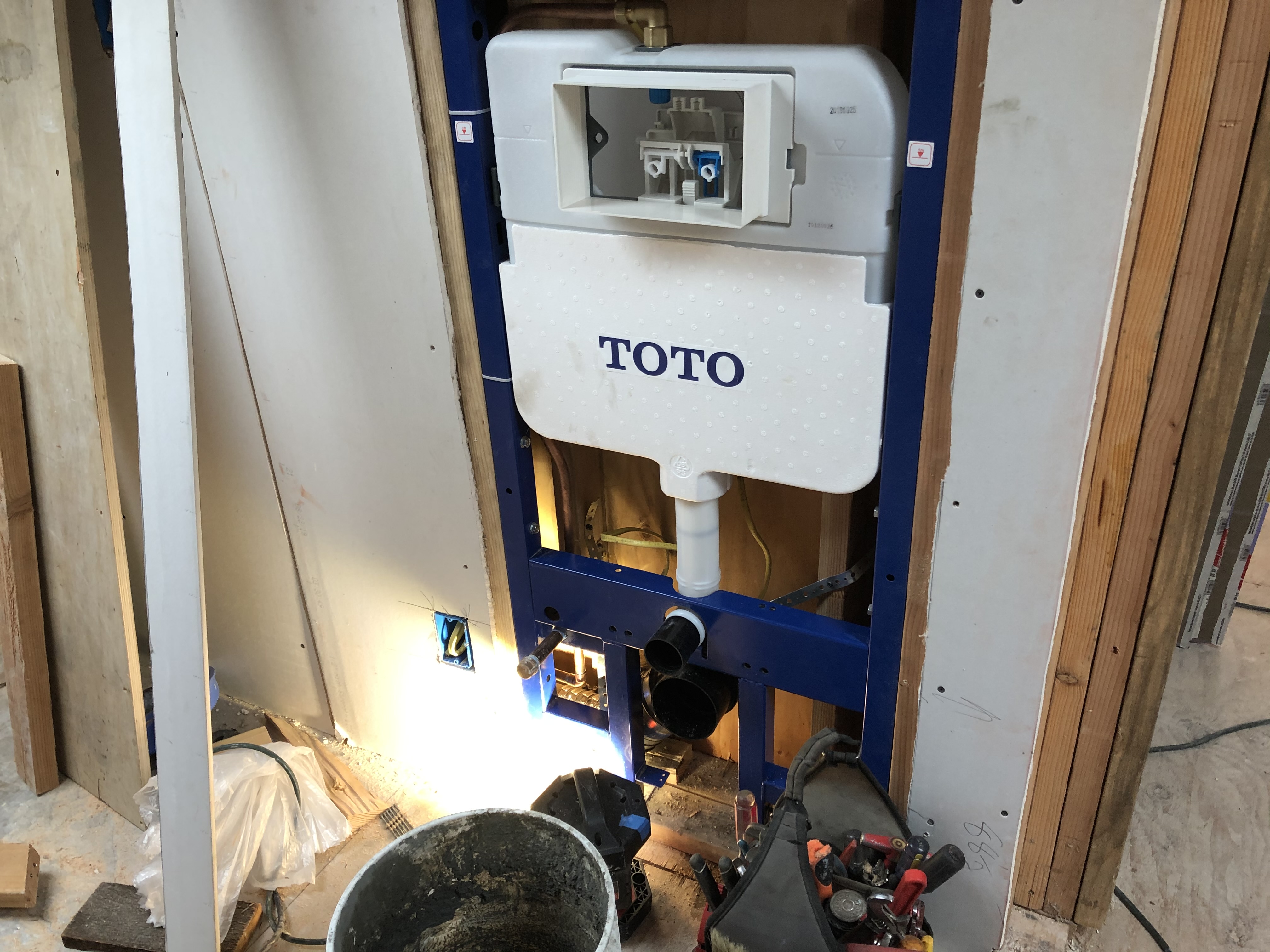 TOTO toilet rough-in during bathroom remodel